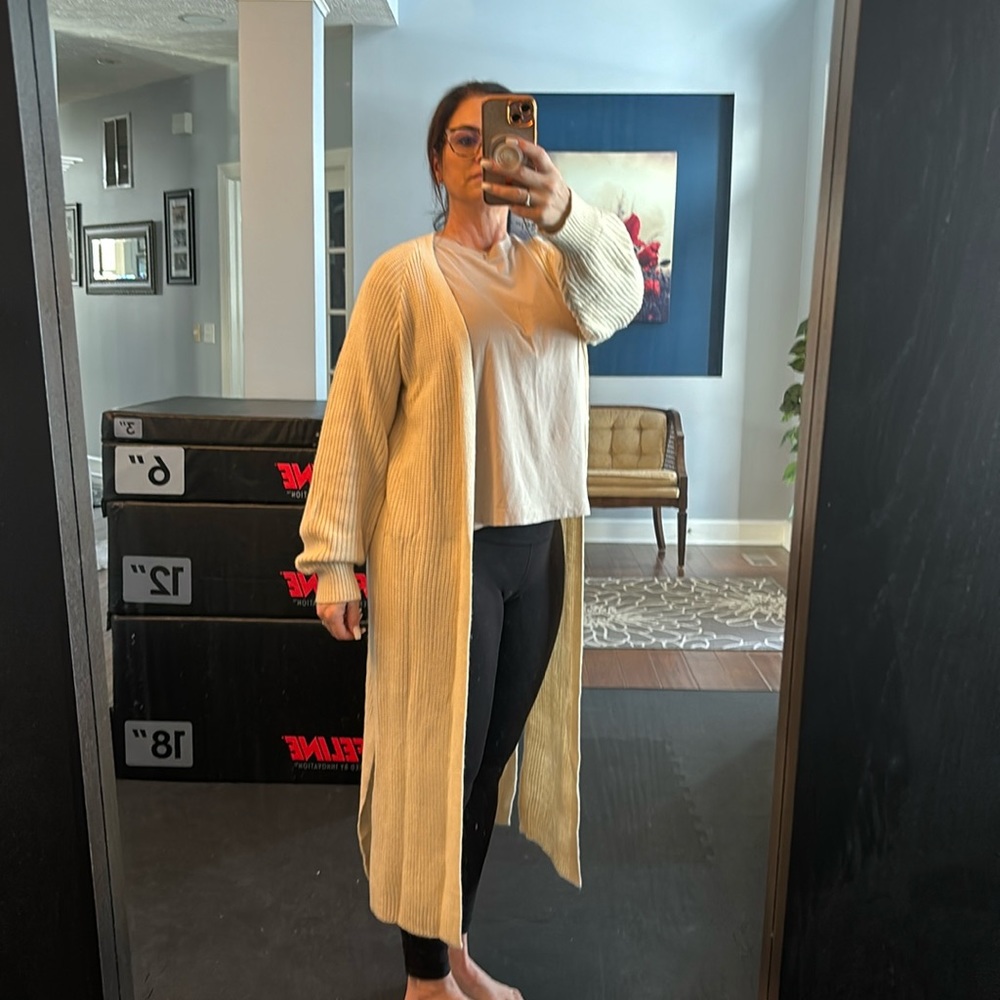 Long cream sweater/duster. Size medium.